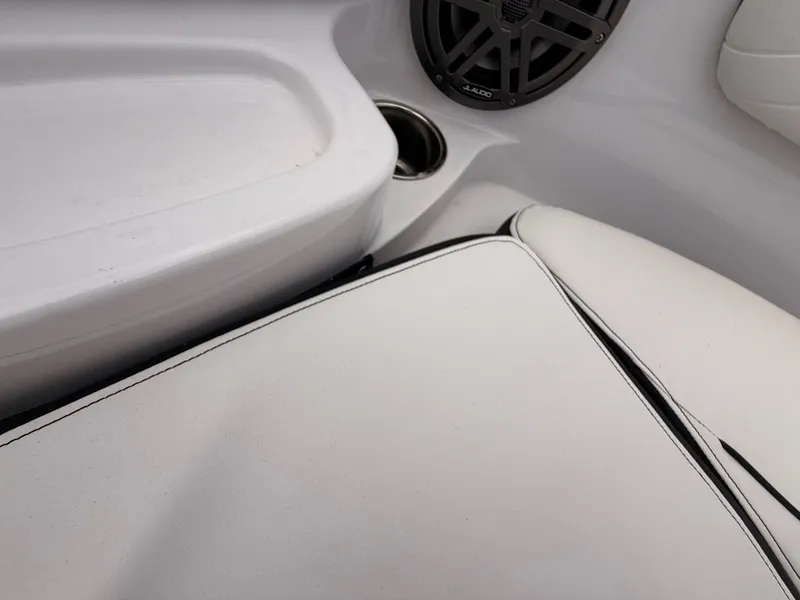 Slide: The Image of Interior of Stingray 23 OSX 2026 with speaker and seat cushion. - 44
