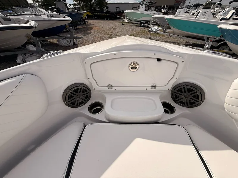 Slide: The Image of Interior view of 2026 Stingray 23 OSX boat with speakers. - 45