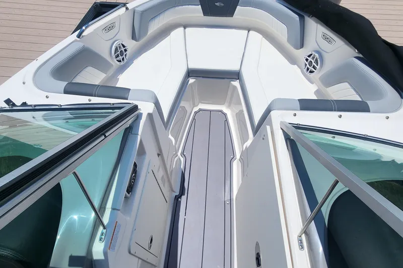 Slide: The Image of 2022 Chaparral 21 SSi OB boat interior with spacious seating and modern design. - 23