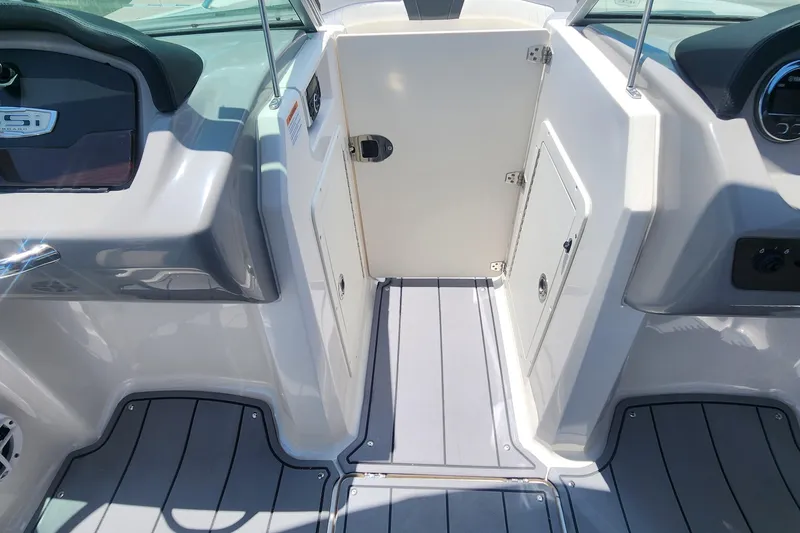 Slide: The Image of Interior view of 2022 Chaparral 21 SSi OB boat, featuring sleek design and modern finishes. - 24