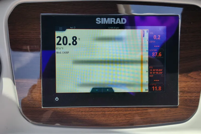 Slide: The Image of Simrad display on 2022 Chaparral 21 SSi OB showing depth and water temperature. - 37