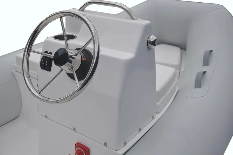 Slide: The Image of Manufacturer Provided Image: Steering console of AB Inflatables Mares 12 VSX 2026. - 1