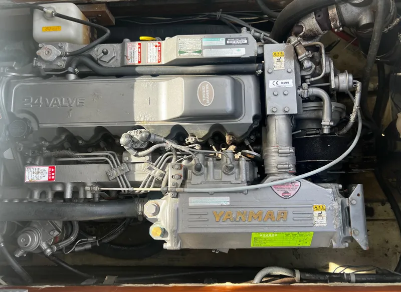Slide: The Image of Engine of a 1974 Dyer 29' Sport Fisher boat, featuring Yanmar components. - 34