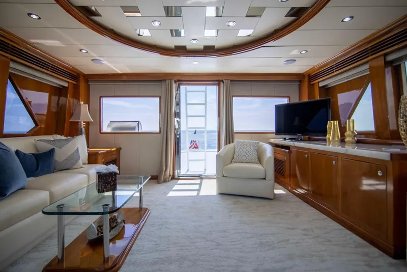 Slide: The Image of Luxurious interior of 2001 Hargrave 94 yacht with elegant furnishings and ocean view. - 12