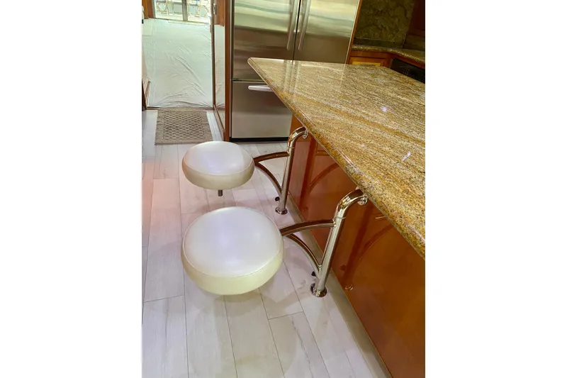 Slide: The Image of Luxury yacht kitchen with granite countertop and built-in stools, Hargrave 94, 2001 model. - 26