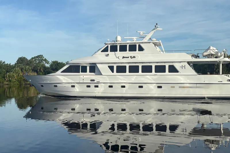 Slide: The Image of Luxury 2001 Hargrave 94 yacht "Sweet Life" reflecting on calm water. - 4