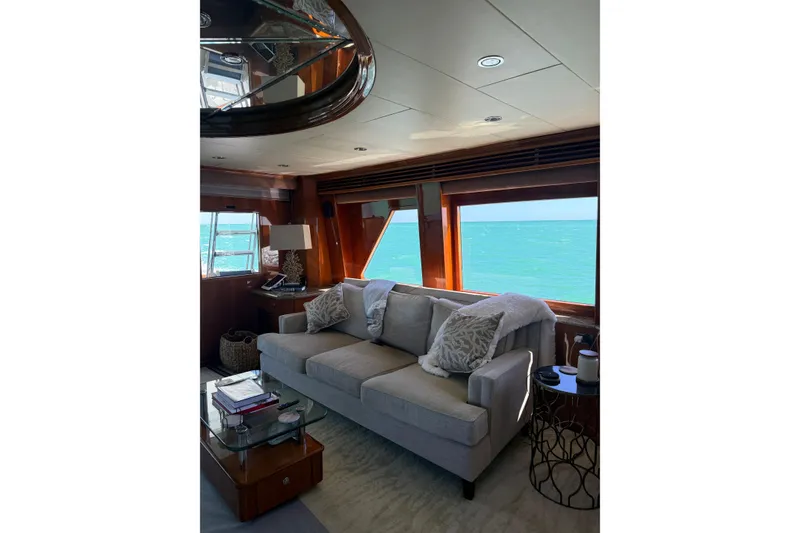 Slide: The Image of Luxurious interior of 2001 Hargrave 94 yacht with ocean view through large windows. - 43