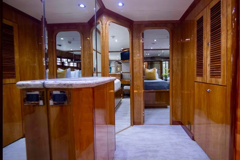Slide: The Image of Luxurious interior of 2001 Hargrave 94 yacht with polished wood and elegant furnishings. - 70