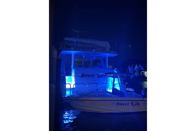 Slide: The Image of Hargrave 94 yacht "Sweet Life" illuminated in blue at night, 2001 model. - 8