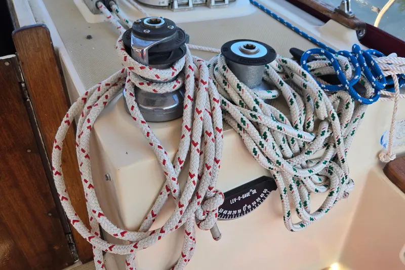 Slide: The Image of Sailboat winches and ropes on a 1989 Island Packet 35 deck. - 22