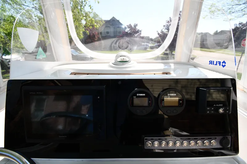 Slide: The Image of Control panel of 2021 Tidewater 210 CC Adventure boat with Yamaha gauges. - 11