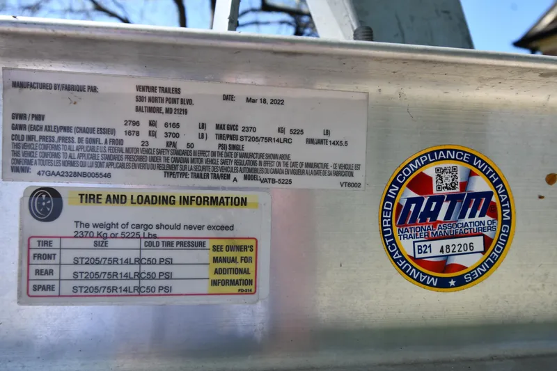 Slide: The Image of Trailer compliance label with tire and loading information for Tidewater 210 CC Adventure, 2021 model. - 31