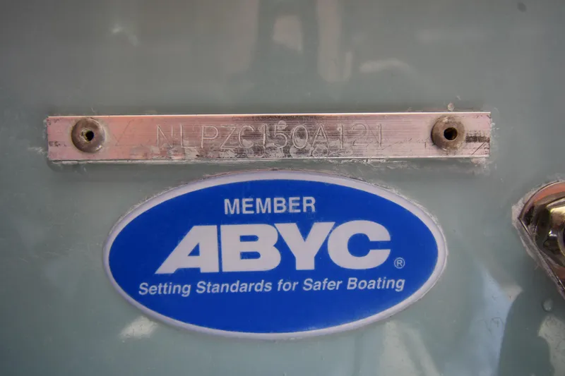 Slide: The Image of 2021 Tidewater 210 CC Adventure boat with ABYC member plaque and serial number. - 32