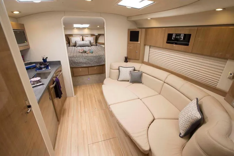 Slide: The Image of Manufacturer Provided Image: Interior of a 2016 Formula 37 Cruiser yacht with modern furnishings and cozy bedroom. - 11