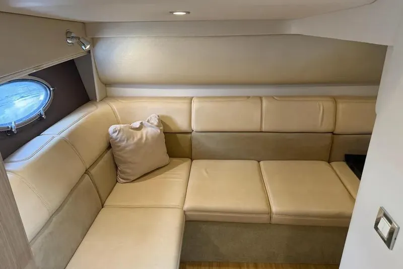 Slide: The Image of Luxurious beige interior of 2016 Formula 37 Performance Cruiser with plush seating. - 29