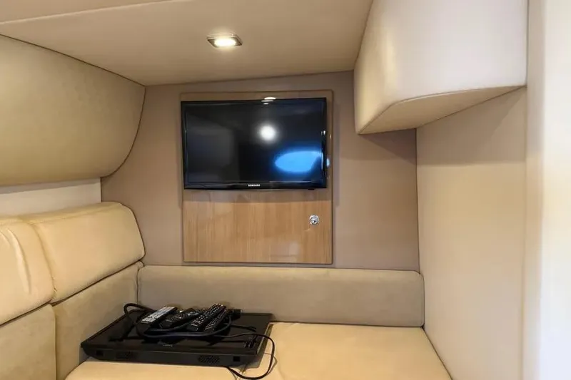 Slide: The Image of Interior of 2016 Formula 37 Performance Cruiser with TV and beige seating. - 31