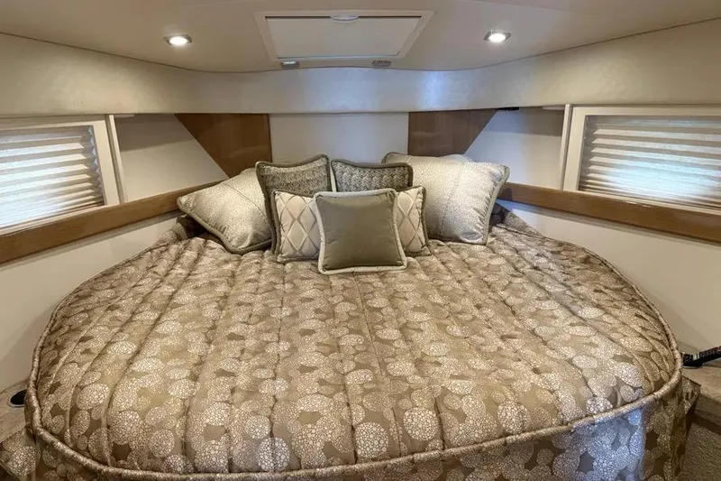 Slide: The Image of Luxurious cabin interior of 2016 Formula 37 Performance Cruiser with plush bedding and pillows. - 32