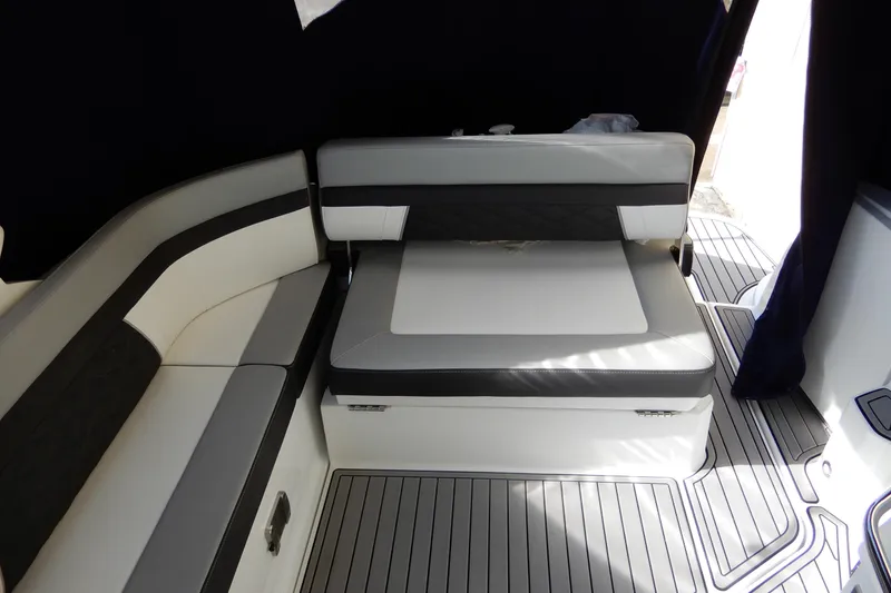 Slide: The Image of Interior seating of 2022 Monterey 295 Sport Yacht with sleek, modern design. - 11