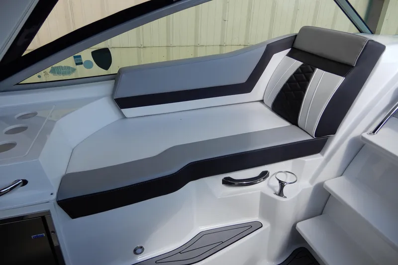 Slide: The Image of 2022 Monterey 295 Sport Yacht interior seating with modern design and sleek upholstery. - 17