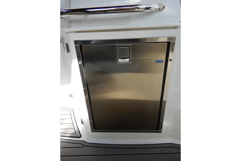 Slide: The Image of Stainless steel door on 2022 Monterey 295 Sport Yacht, featuring sleek design and modern handle. - 19