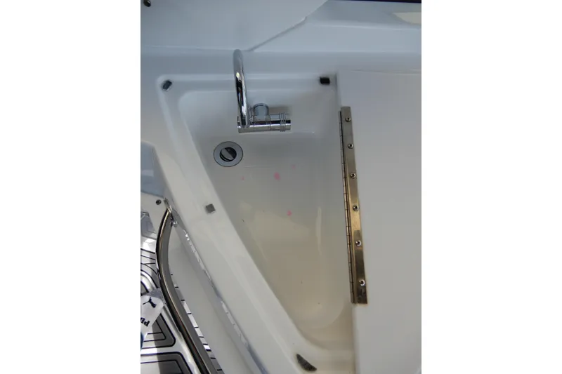Slide: The Image of Interior view of 2022 Monterey 295 Sport Yacht sink area with chrome faucet. - 20