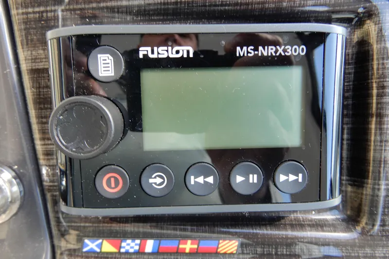 Slide: The Image of Fusion MS-NRX300 stereo system on 2022 Monterey 295 Sport Yacht dashboard. - 25