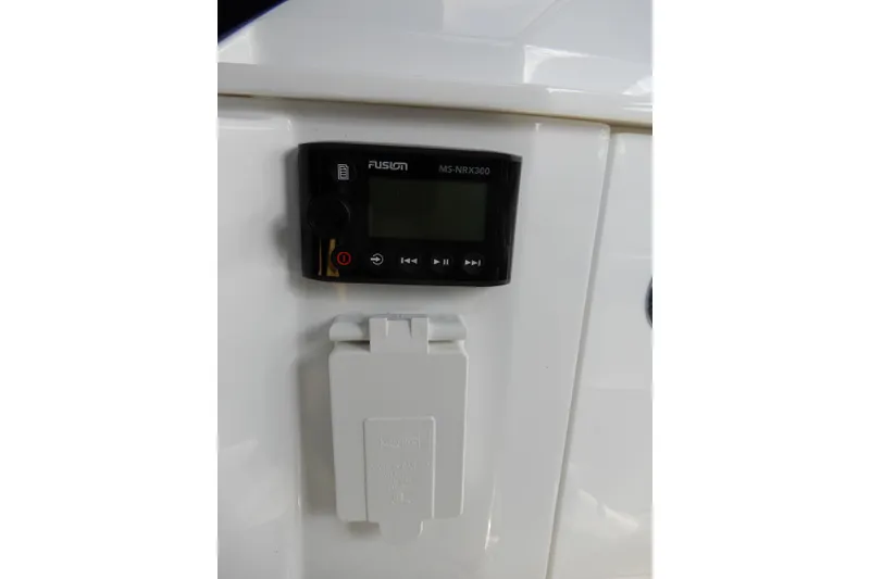 Slide: The Image of Fusion MS-NRX300 stereo system on 2022 Monterey 295 Sport Yacht dashboard. - 30