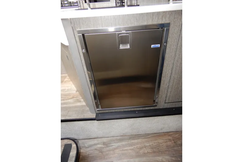 Slide: The Image of Stainless steel refrigerator in 2022 Monterey 295 Sport Yacht interior. - 45