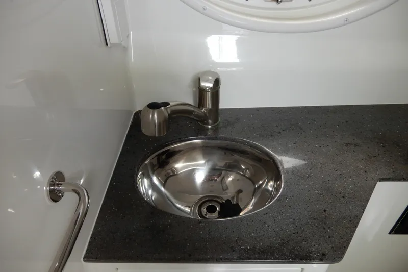 Slide: The Image of Stainless steel sink and faucet on Monterey 295 Sport Yacht 2022. - 47