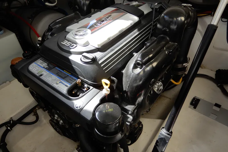 Slide: The Image of Engine of 2022 Monterey 295 Sport Yacht, featuring a 6.2L 350 horsepower motor. - 51