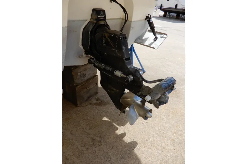 Slide: The Image of 2022 Monterey 295 Sport Yacht with Mercury outboard engine on display. - 60