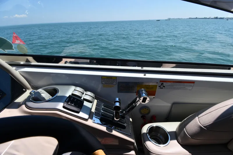 Slide: The Image of Interior view of a 2009 Formula 400 Super Sport boat with ocean backdrop. - 15