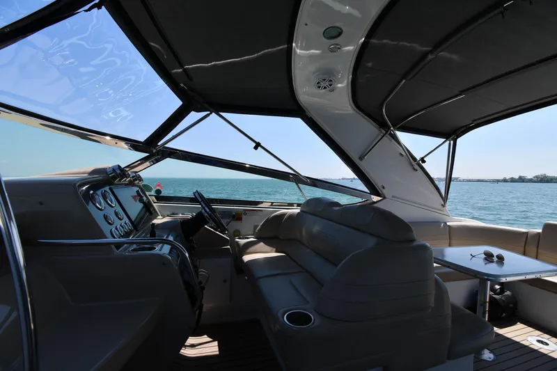 Slide: The Image of Interior of a 2009 Formula 400 Super Sport yacht with leather seating and ocean view. - 17