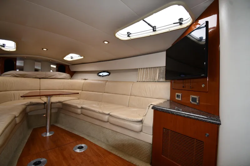 Slide: The Image of Luxurious interior of a 2009 Formula 400 Super Sport yacht with plush seating and TV. - 30