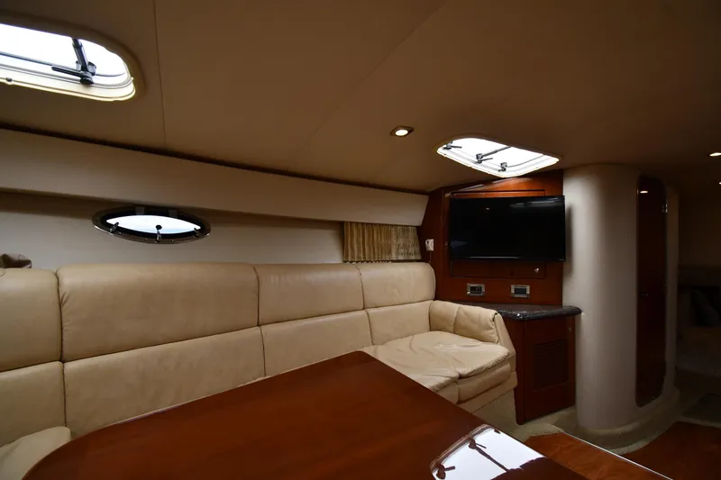 Slide: The Image of Luxurious interior of a 2009 Formula 400 Super Sport yacht with leather seating and TV. - 33