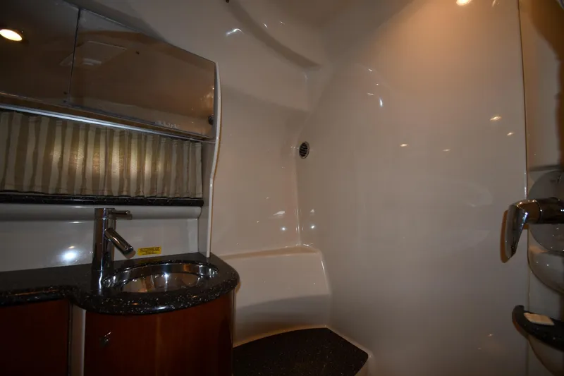 Slide: The Image of Interior of 2009 Formula 400 Super Sport yacht bathroom with sink and shower. - 37