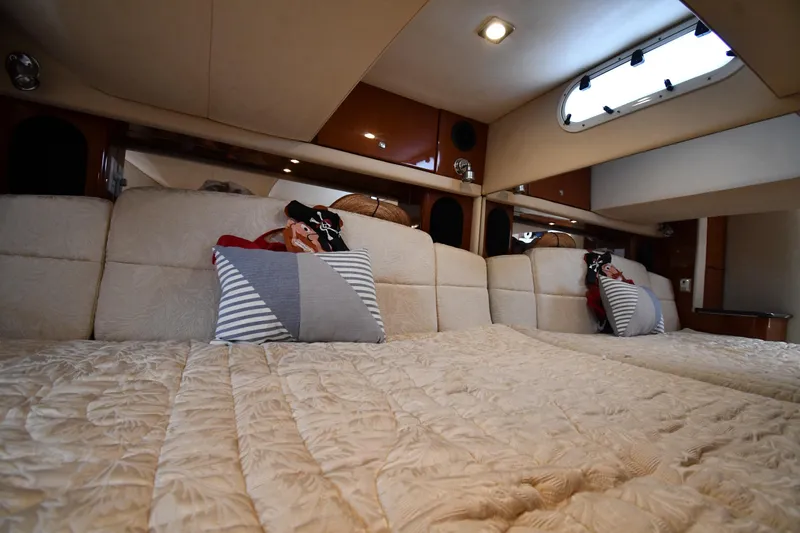 Slide: The Image of Luxurious interior of 2009 Formula 400 Super Sport yacht with plush bedding and pillows. - 44