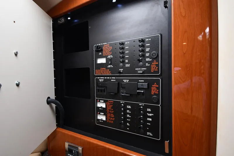 Slide: The Image of Electrical control panel inside a 2009 Formula 400 Super Sport boat. - 48