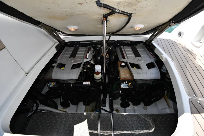 Slide: The Image of 2009 Formula 400 Super Sport engine compartment with twin MerCruiser engines. - 51