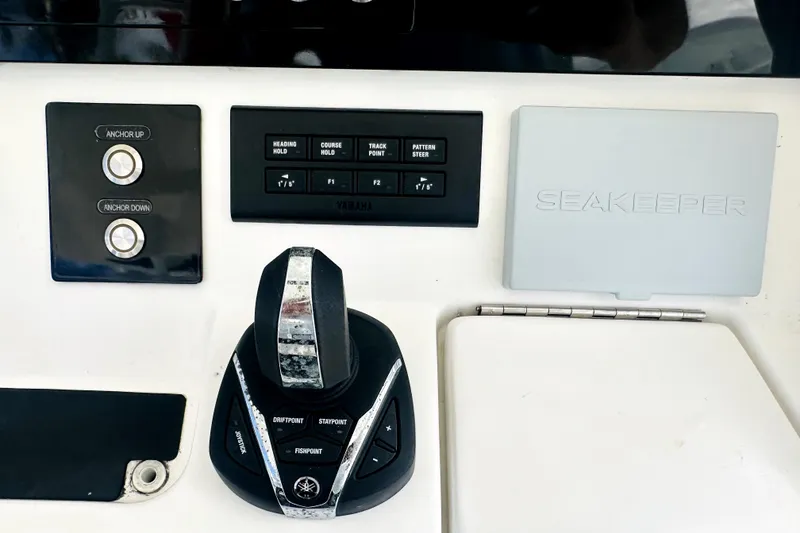 Slide: The Image of Control panel of a 2020 Regulator 34 boat featuring Seakeeper and Yamaha systems. - 13