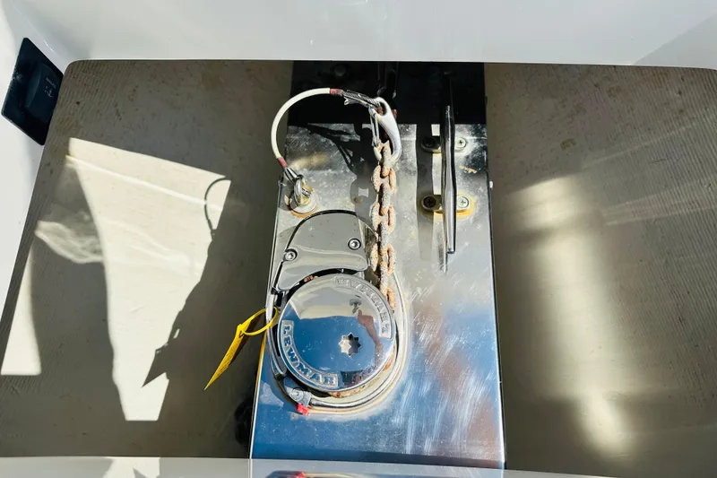 Slide: The Image of Anchor chain mechanism on a 2020 Regulator 34 boat, featuring a Lewmar windlass. - 26