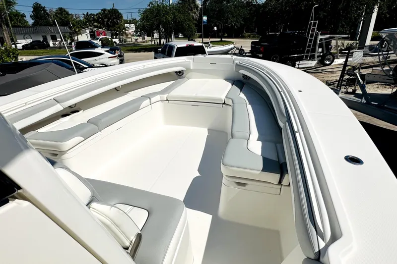 Slide: The Image of 2020 Regulator 34 boat interior with spacious seating and sleek design. - 4