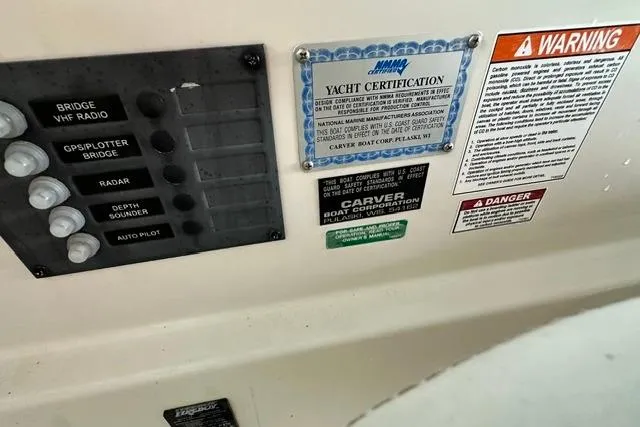 Slide: The Image of Control panel and certification labels on a 2004 Carver 360 Mariner yacht. - 19