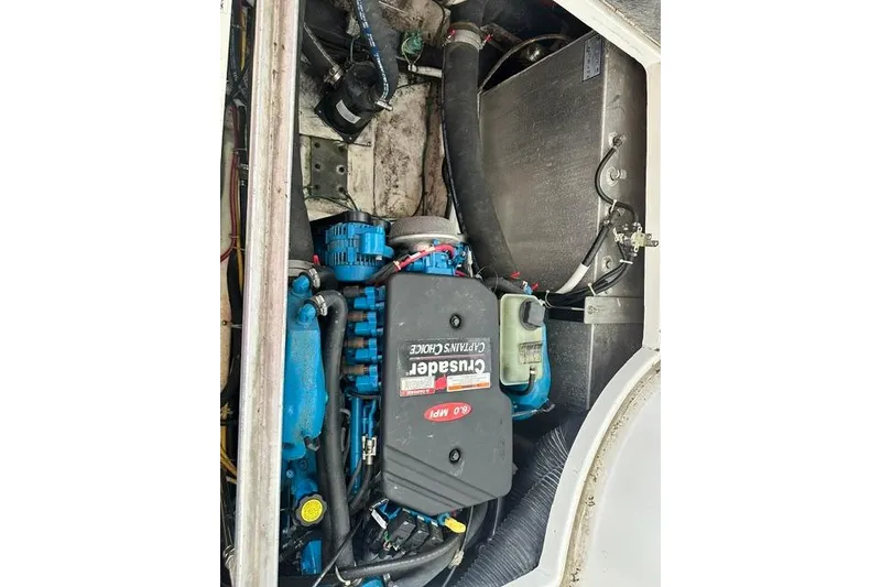Slide: The Image of Engine compartment of a 2004 Carver 360 Mariner with Crusader engine. - 32