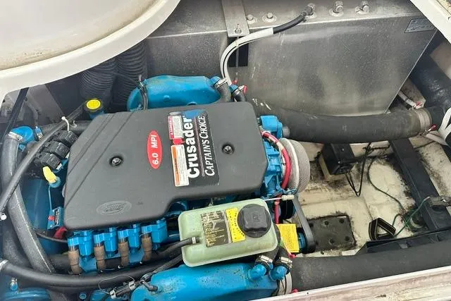 Slide: The Image of Engine compartment of a 2004 Carver 360 Mariner with Crusader 6.0 MPI engine. - 34