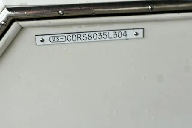 Slide: The Image of 2004 Carver 360 Mariner boat identification plate with serial number CDRS8035L304. - 37