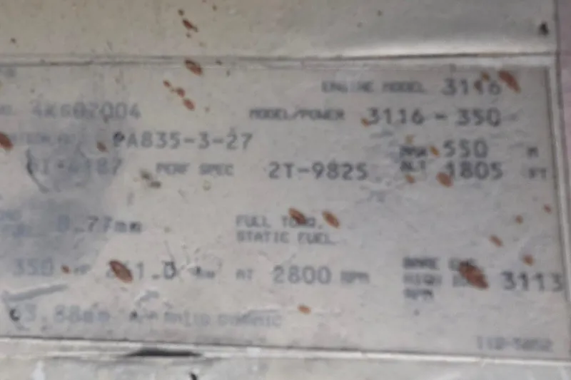 Slide: The Image of Blurred engine specification label for a 1998 Sea Ray 370 Express Cruiser. - 25