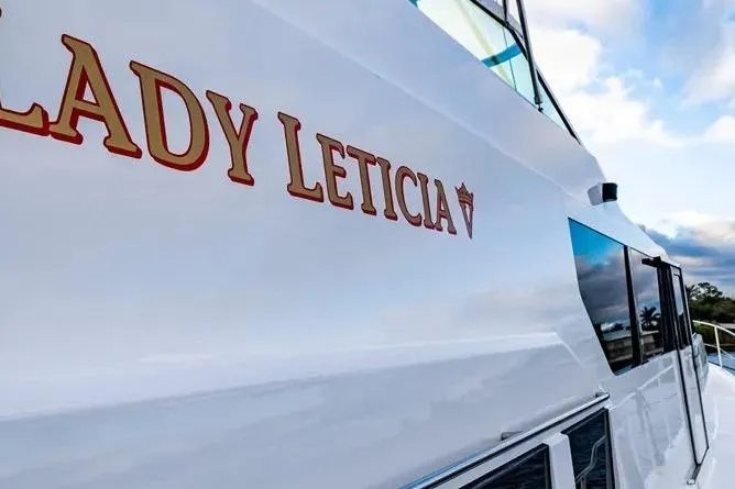 Slide: The Image of 2000 Pacific Mariner 65 Motoryacht "Lady Leticia" exterior view with clear sky. - 2