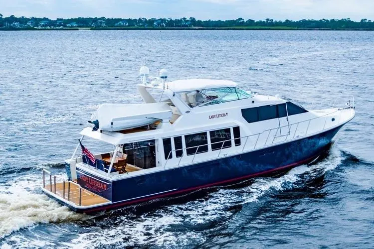 Slide: The Image of 2000 Pacific Mariner 65 Motoryacht cruising on open water. - 40