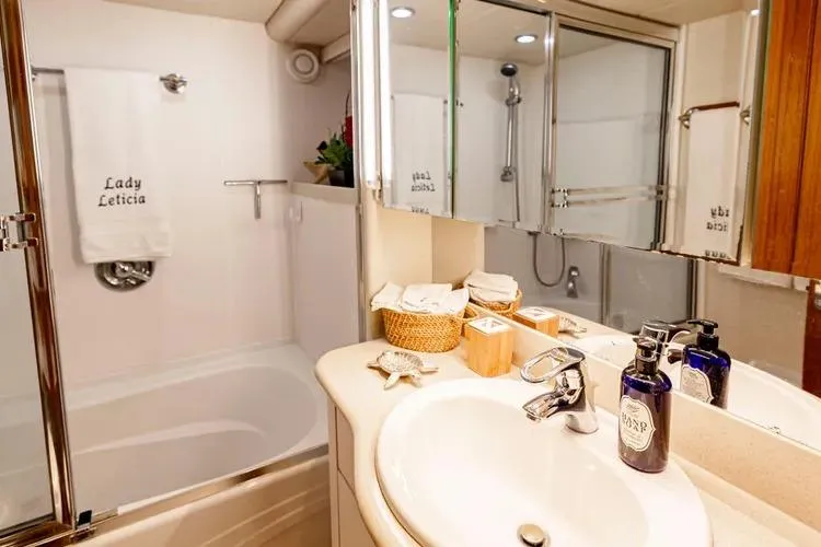 Slide: The Image of Luxurious bathroom in 2000 Pacific Mariner 65 Motoryacht with elegant fixtures and decor. - 55